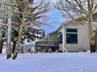 More Details about MLS # 973243 : 1600 WAPITI CIR 51 ESTES PARK CO 80517